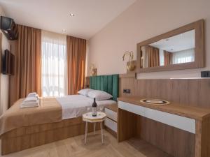 Postel nebo postele na pokoji v ubytování Hotel Diman