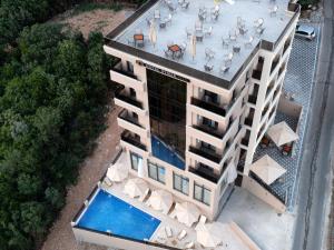 Bazén v ubytování Hotel Diman nebo v jeho okolí