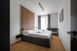 Voodi või voodid majutusasutuse Apartmány Florián toas