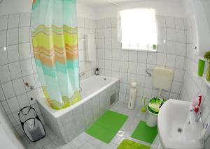 Kúpeľňa v ubytovaní Apartments Žugec + 22 fotografií