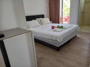 Apartments Verona tesisinde bir odada yatak veya yataklar