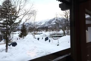 Snowlines Lodge Hakuba om vinteren