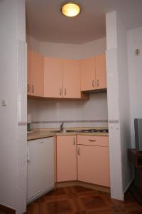 Kuchyň nebo kuchyňský kout v ubytování Apartments and rooms by the sea Pag - 6311