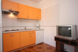 Kuchyň nebo kuchyňský kout v ubytování Apartments and rooms by the sea Pag - 6311