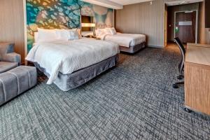 Postel nebo postele na pokoji v ubytování Courtyard by Marriott Westbury Long Island