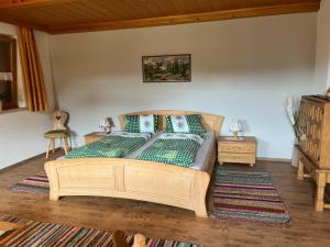 A bed or beds in a room at Stegerbauer