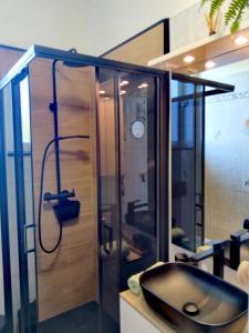 a bathroom with a sink and a shower at Apartment Volosko View in Opatija +41 photos