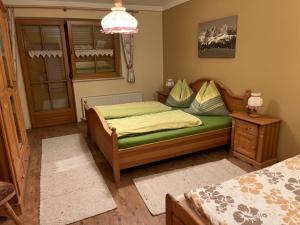 A bed or beds in a room at Stegerbauer