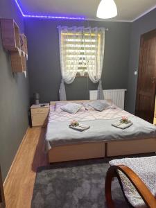 Postel nebo postele na pokoji v ubytování Pokoje u Kasi i Marcina