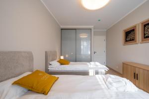 Postel nebo postele na pokoji v ubytování STORIES Design ApartHotel