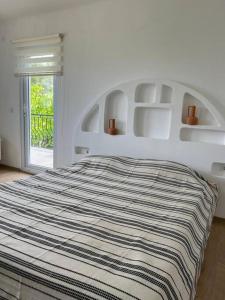 Posteľ alebo postele v izbe v ubytovaní Doğa içinde havuzlu villa