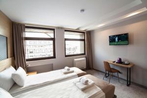 TV a/nebo společenská místnost v ubytování Prince Rooftop