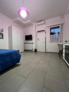 Televízia a/alebo spoločenská miestnosť v ubytovaní Casa Cirenaica Art House