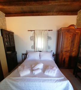 Katil atau katil-katil dalam bilik di Mani Fort Charabos