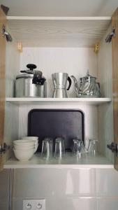 Kuchyň nebo kuchyňský kout v ubytování Appartement AL-RIMAL POUR LES FAMILLES
