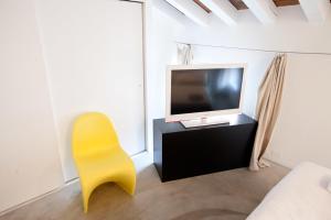 TV a/nebo společenská místnost v ubytování Casa Valentina + 32 fotografií