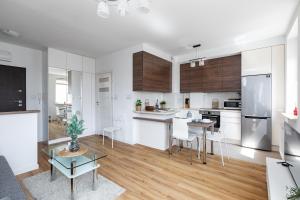 A cozinha ou cozinha compacta de SuperApart Kamienna 1