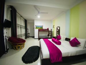 Postel nebo postele na pokoji v ubytování Sohili 3R Resort Ella