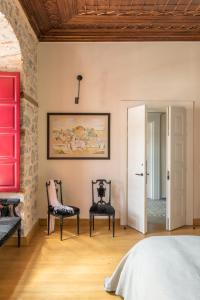 Postel nebo postele na pokoji v ubytování FOS Hydra residence
