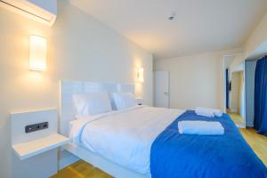 Postel nebo postele na pokoji v ubytování Orbi City Hotel Official D Block