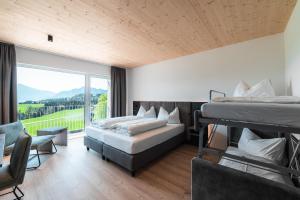 Landhotel Prielbauer客房内的一张或多张床位