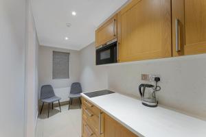 Cleveland Residences Paddington的厨房或小厨房