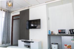 Kuchyň nebo kuchyňský kout v ubytování Lakewalk Cabin + 7 fotografií