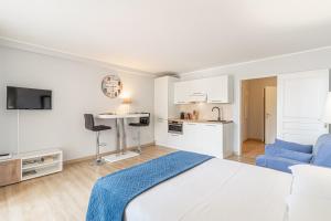 Η κουζίνα ή μικρή κουζίνα στο AppartHotel Jardins d’Elisa +12 φωτογραφίες