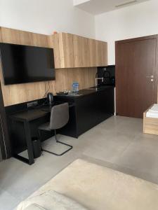 Kuchnia lub aneks kuchenny w obiekcie Aparthotel Łódź 55 Piotrkowska