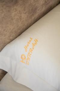 Postel nebo postele na pokoji v ubytování Hotel Dyrrah