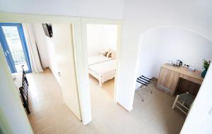 a view of a living room with a couch and a table at Elpida Village in Istro