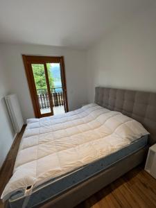 Ένα ή περισσότερα κρεβάτια σε δωμάτιο στο Residence Miralago 15