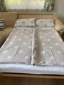Posteľ alebo postele v izbe v ubytovaní Garten Apartment Diwoky