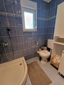 Koupelna v ubytování APARTMAN MAOR + 9 fotografií