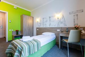 Voodi või voodid majutusasutuse PracticOtel toas