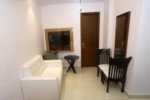 Posezení v ubytování VRINDAVAN GUEST HOUSE