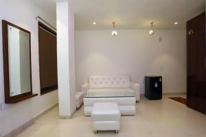 Posezení v ubytování VRINDAVAN GUEST HOUSE