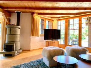 TV a/nebo společenská místnost v ubytování Rafaches