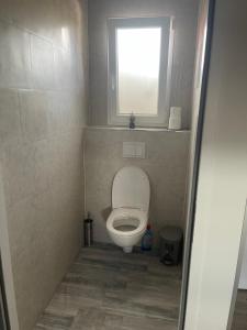 Koupelna v ubytování Appartement - location saisonnière