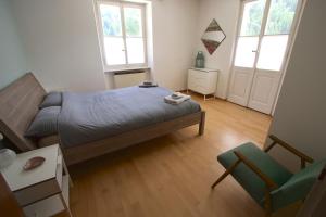 Voodi või voodid majutusasutuse Chalet Cuore delle Alpi toas