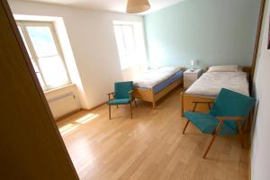 Voodi või voodid majutusasutuse Chalet Cuore delle Alpi toas