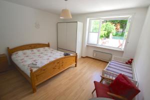 Voodi või voodid majutusasutuse Chalet Cuore delle Alpi toas