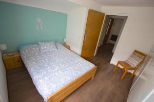 Voodi või voodid majutusasutuse Chalet Cuore delle Alpi toas