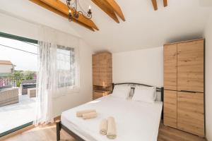 Posteľ alebo postele v izbe v ubytovaní Stone House Luna