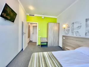 Voodi või voodid majutusasutuse PracticOtel toas