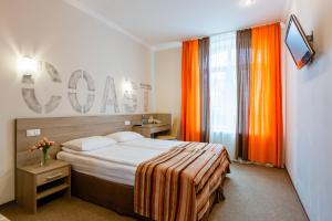 Voodi või voodid majutusasutuse PracticOtel toas