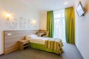 Voodi või voodid majutusasutuse PracticOtel toas