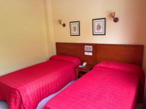 Posteľ alebo postele v izbe v ubytovaní Hotel Acquamaris 3000