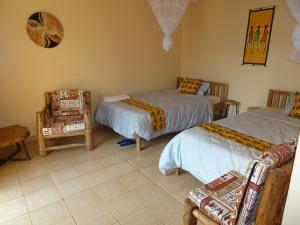 Postel nebo postele na pokoji v ubytování Lycklama Guesthouse