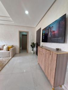 TV a/nebo společenská místnost v ubytování Family modern flat near McDo & Beach